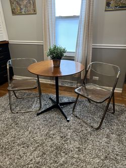 Eames Table And Lucite Chairs