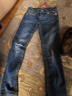 Size 7 for girls and boy pants, size 3 for sorel shoes and 5 for other 2 pair of girl shoes