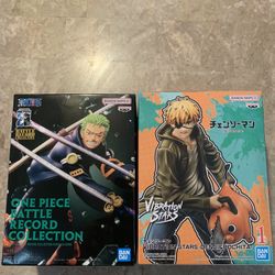 Zoro and Denji statues