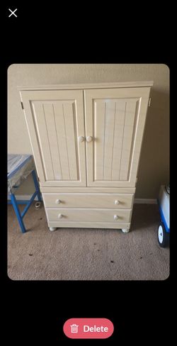 Nice white dresser with hanger rack and 2 drawers