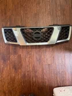 Chrome front grille for a 2007 Nissan Pathfinder