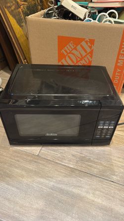 Sunbeam Black Countertop Microwave small. 17in by 12 inches