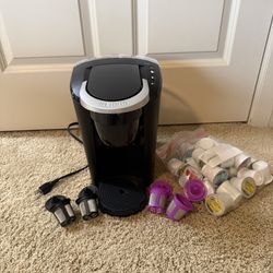 Keurig' K-Compact® Coffee Maker with k-cups and reusable cups