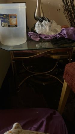 Gold legged glass side table