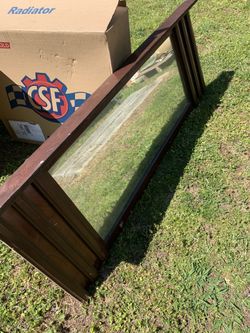 Mirror with shelf top