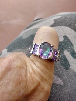 Brand new size 8 mystic topaz set in genuine stamped 925 sterling silver