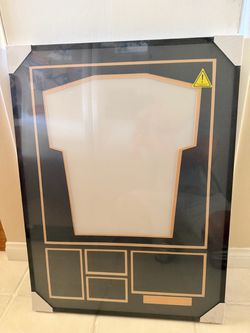 Jersey display frame with picture slots
