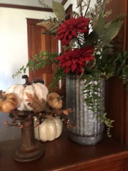 Galvanized vase with flowers