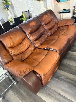 Brown Leather Reclining Sofa