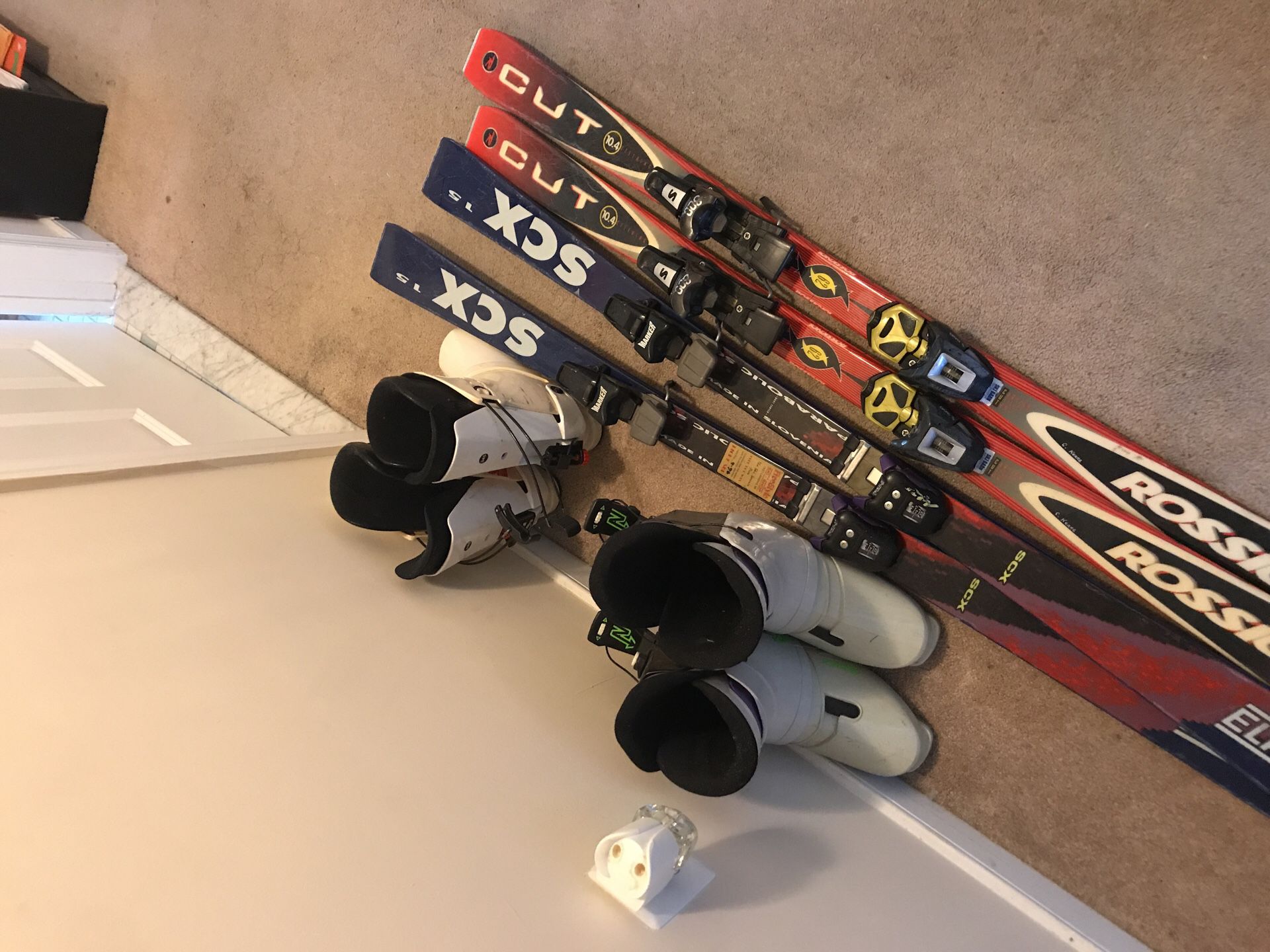 Skis and boots fit sizes 9-11 mens