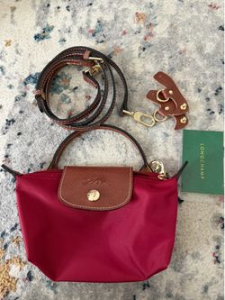 Red mini Longchamp bag