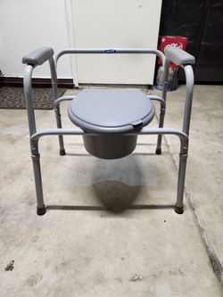 Invacare brand portable bedside commode chair