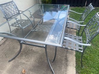 Rod iron table and 3 chairs