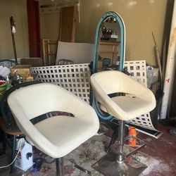 Two White Leather Barstools, They swivel and go Up And Down