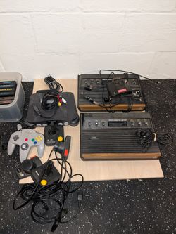 Nintendo 64 And 2 Atari's + Games