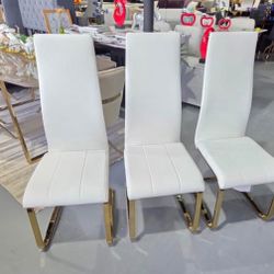 DINING CHAIR WHITE FAUX LEATGER GOLD LEGS
