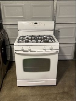 Gas stove white  4 burnes everything works we deliver