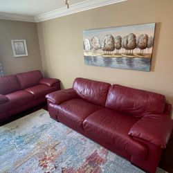 Red Leather Sofas $250. Each