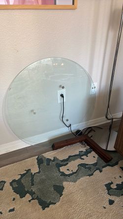 Medium round glass coffee table