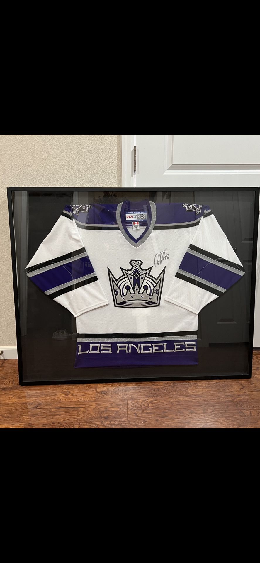 Autographed Los Angeles Kings professional framed jersey #28