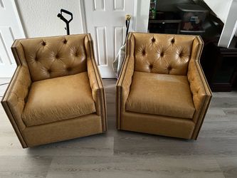 Pair of Tufted Leather Club Chairs with Nailhead Trim