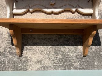 Wooden shelf unstained