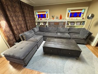 Grey L-shaped modular sectional