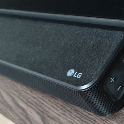 LG sound bar，sub woofer and 55" TV