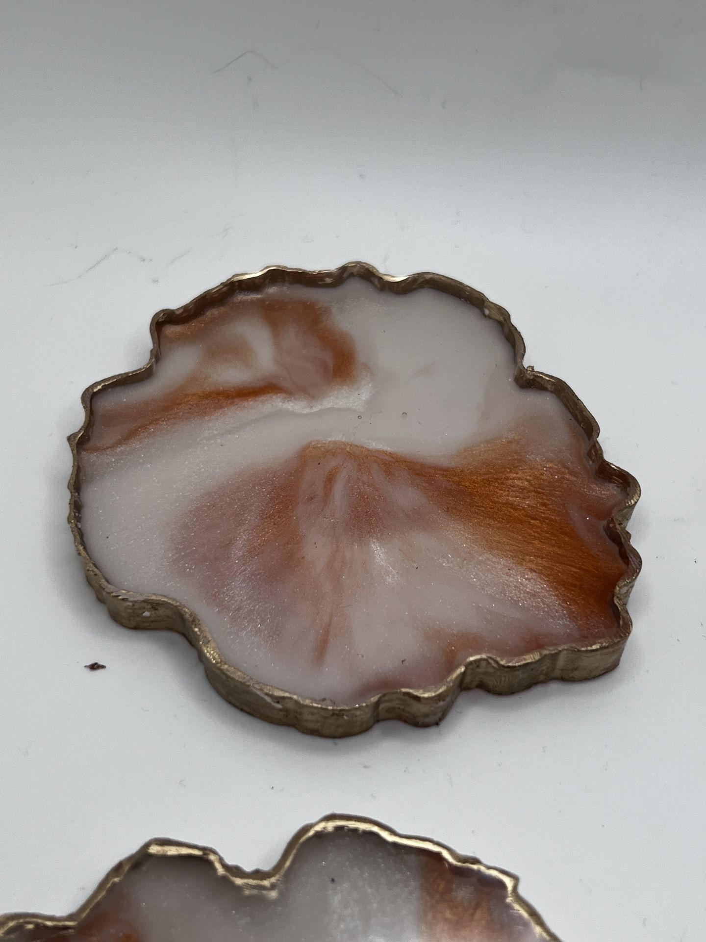 Set Of Four Copper And White Handmade Resin Coasters