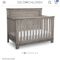 Delta Crib With Newman Mattress And Newman Mattress Pad