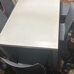 Herman Miller Table , and six chairs, the bellini chair. heller made in usa