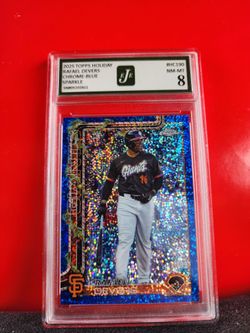 2025 Topps Holiday Chrome Rafael Devers Blue Sparkle refractor is graded by EJE NM-MT 8.
