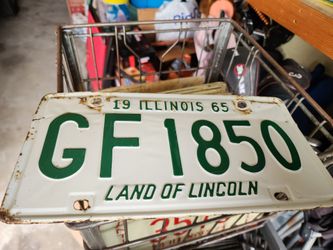 Two 1965 matching license plates