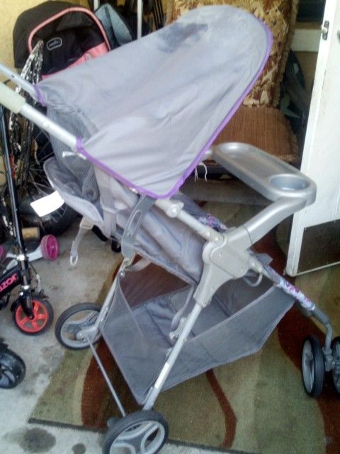 Stroller Is In Great Condition Lilac and Grey In Color.