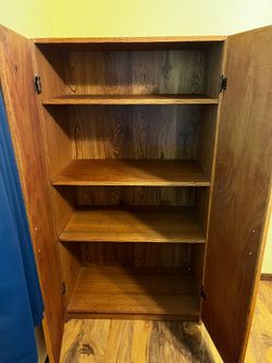 Wooden dresser with adjustable shelves