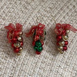 Three jingle Bells Shiny Gold, Red And Green With Beautiful Bows