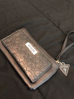 Woman’s Guess Wallet/Hand Purse