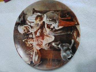 The first limited edition The Toy Maker Plate BY NORMAN ROCKWELL