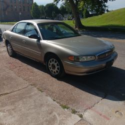 Two thousand one buick century Nice running  Car Little rust on Side Bottom 