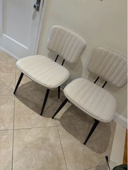 2 Beige Upholstered Chairs