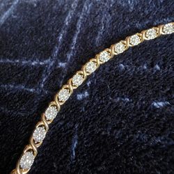 1/4 CTW Natural Diamond Tennis XOXO 7-inch Bracelet in Sterling Silver and Gold