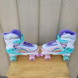 ROLLER SKATE SIZES 4 TO 6 AND  7 TO 9 WHIT LIGHT
