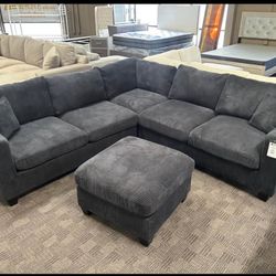Black L Shaped Sectional And Ottoman 