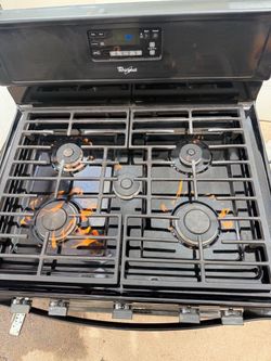 Whirlpool Black Gas Range Stove / oven / everything working good / 45 days warranty