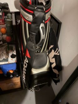 Adam’s leather tour bag.