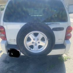 2004 Jeep Liberty Sub-Model: Sport Engine: 6 Cylinders 3.7L