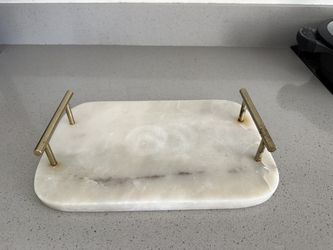 Marble board with gold handle