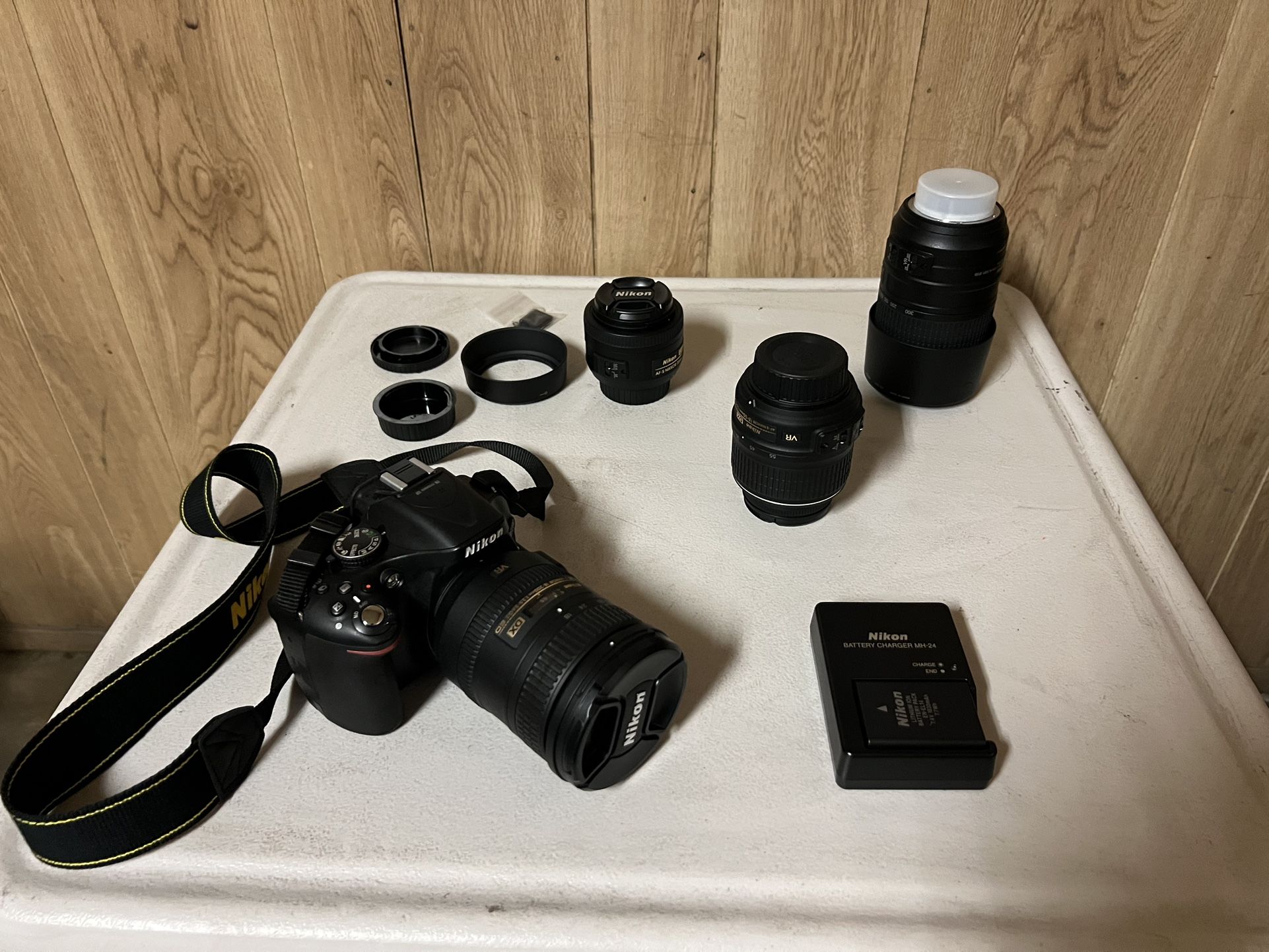 Nikon D5200 24.1 MP DSLR Camera With 4 Different Nikon Lenses And Carrying Case