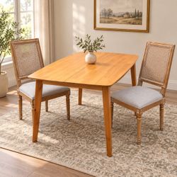 Small Dining Table + 2 Cane-Back Chairs • $125