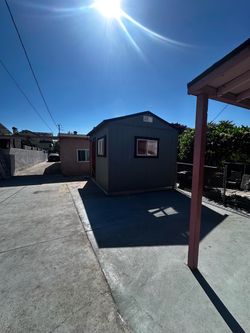Outdoor Storage Shed with Window and Door
